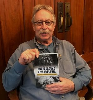 Joel showing his book